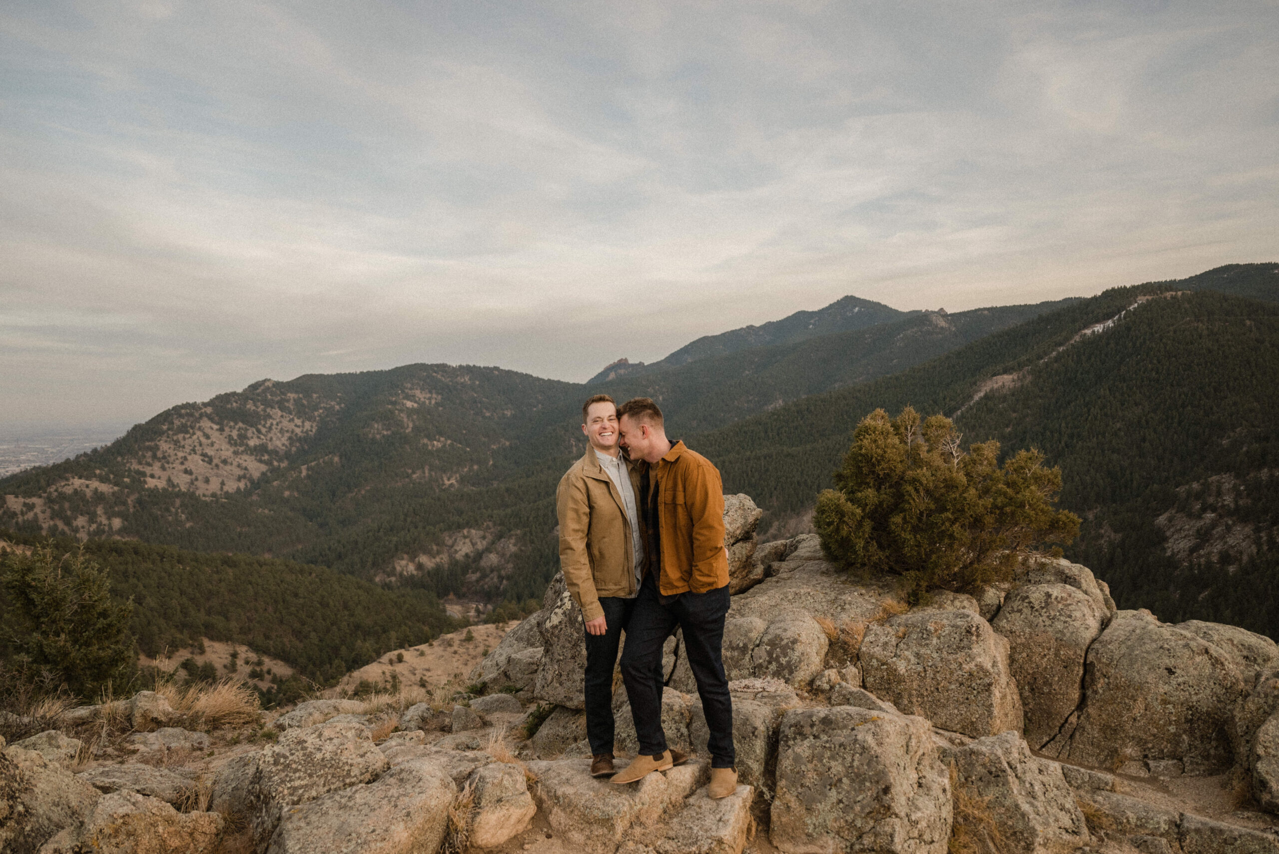 couple posing on the mountains in Colorado