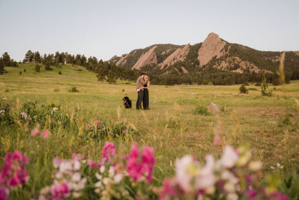 couple posing on the mountains in colorado for their engagement photos | Top 10 Engagement Photo Locations Near Denver