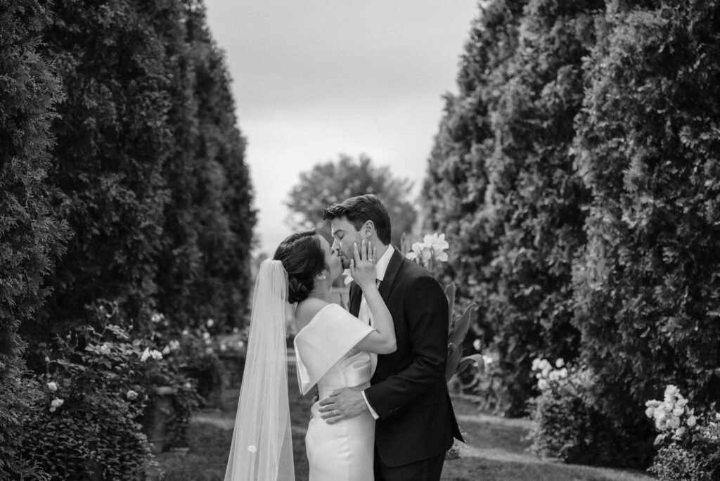 Newlyweds kiss after their ceremony at Denver Botanic Gardens in Colorado
