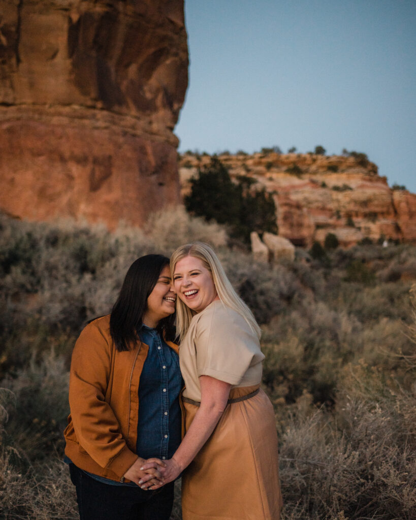 couple posing in the arizona desert for their engagement photos