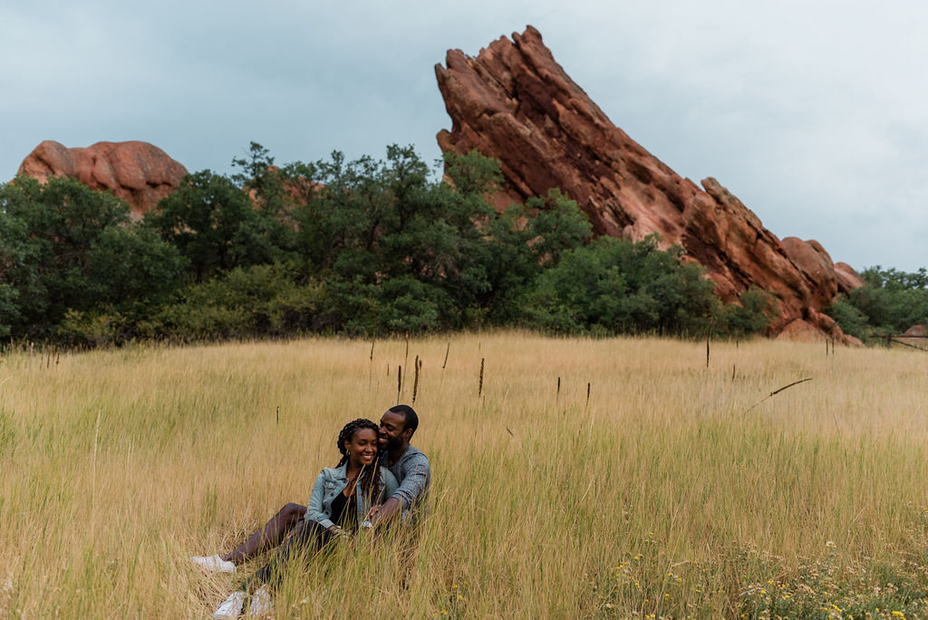 couple posing on the mountains in colorado for their engagement photos | Top 10 Engagement Photo Locations Near Denver