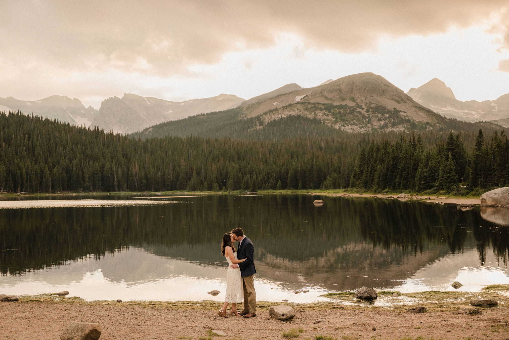couple posing in colorado for their engagement photos