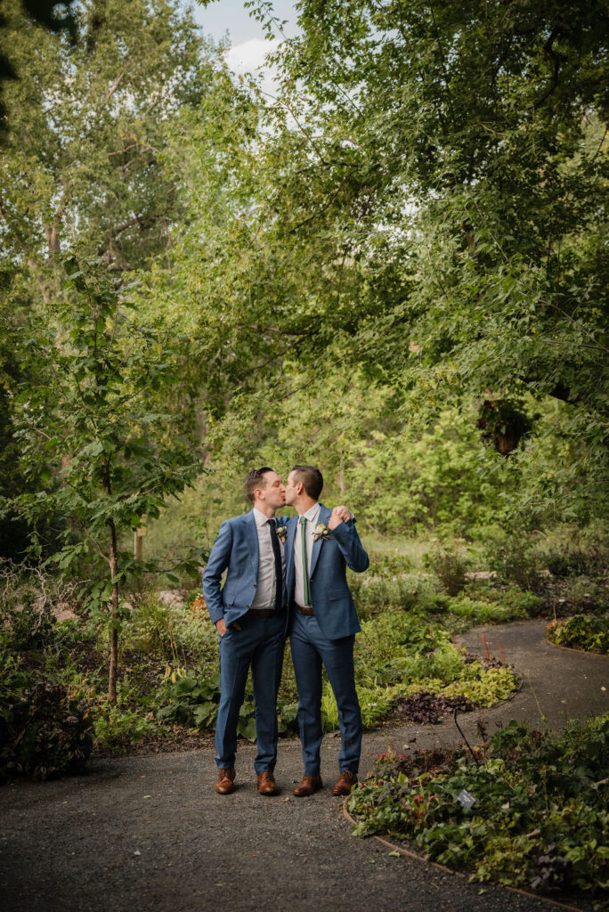 two grooms posing for their couple portraits