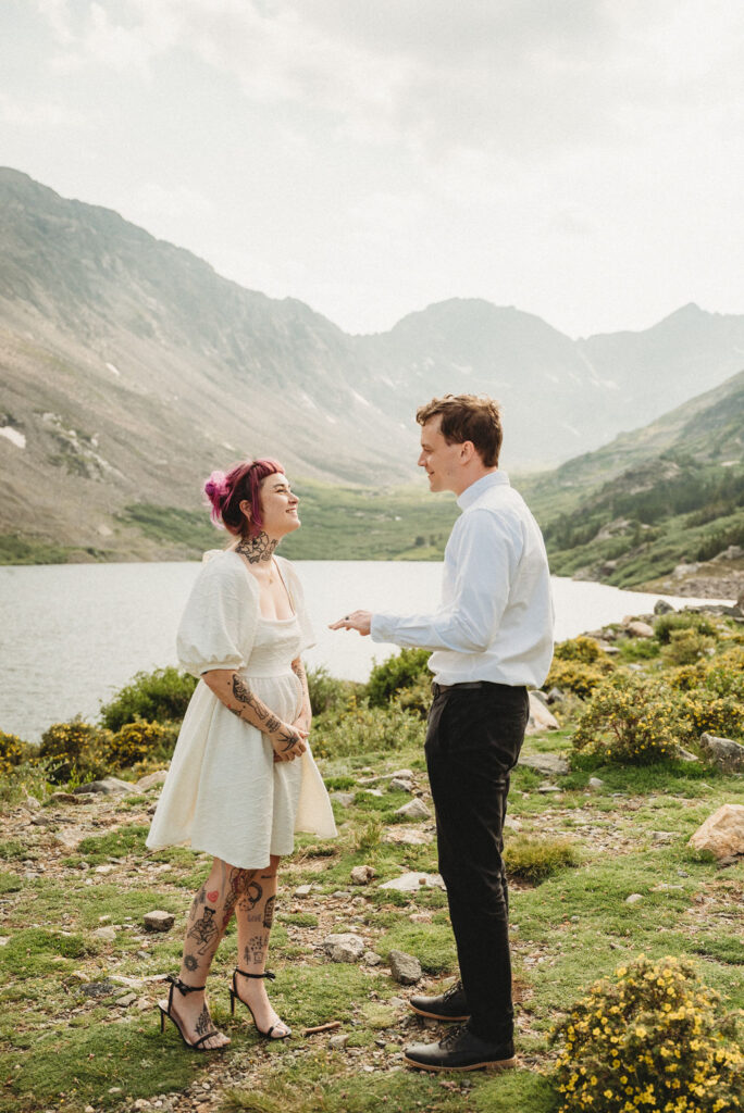couple posing for their elopement photos in the colorado mountains